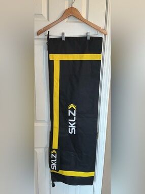 SKLZ Hurricane Select Swing Trainer bag, featuring a black & yellow design